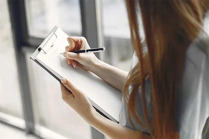Event Organizer with Agenda in Hands